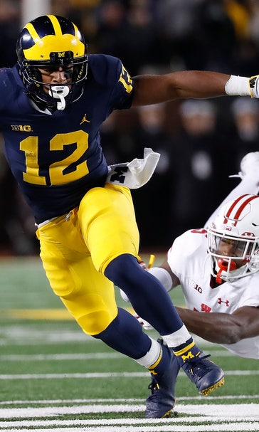 Michigan adjusts to decisions by 4 to skip Peach Bowl